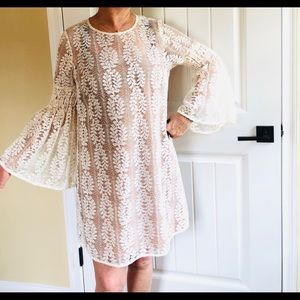 Ivory lace dress, nude slip, Michael Kors.
